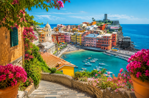 Affordable European coastal town with colorful buildings and turquoise sea