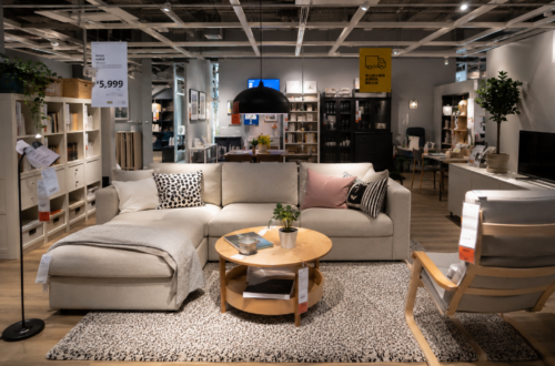Modern Scandinavian-inspired living room featuring stylish IKEA-style furniture, smart storage solutions, and minimalist home décor in a bright furniture showroom.