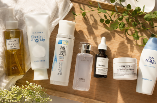 Japanese skincare routine products arranged on a wooden tray